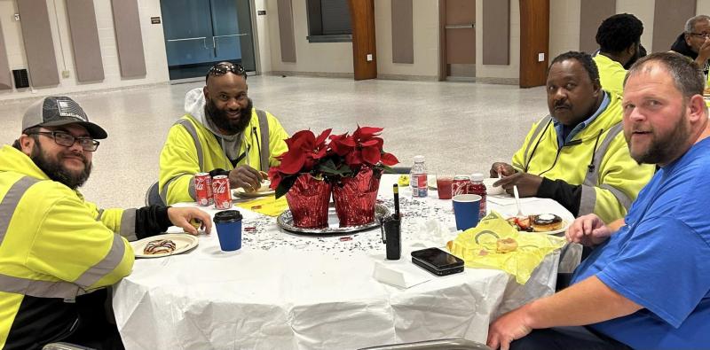 Members of the streets department take a break. Shown are (l-r) Devon Fanning, King Winstead, William Frasier and Mark Clemons.